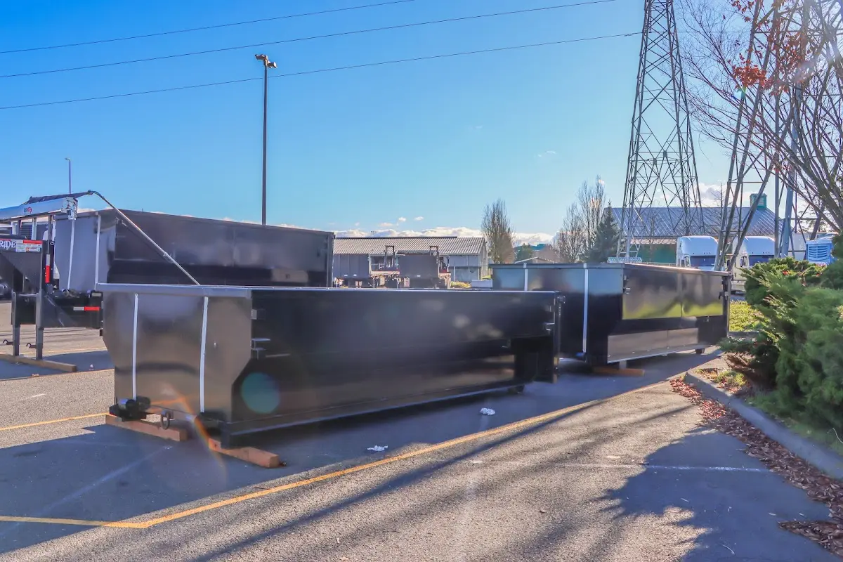 Roll-off dumpster ready for waste disposal at job site for 12 Yard Dumpster Rental in Pine Hill